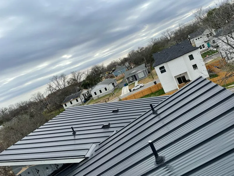 Standing seam metal roof panels with vents for Skylight Repair in Broadlands